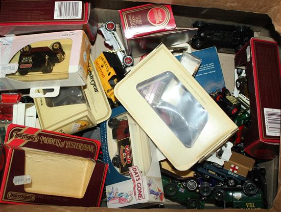 Collection of approx 35 Matchbox Models of Yesteryear diecast vehicles and wall mounting display cabinet(-)